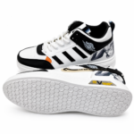 Modern Black-White Sneakers with Orange Accents - Image 4